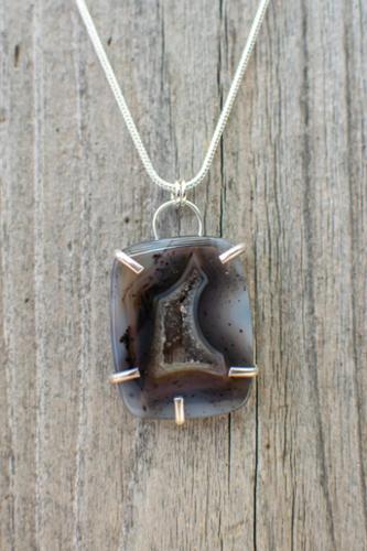 Natural druzy agate set in sterling silver prong setting