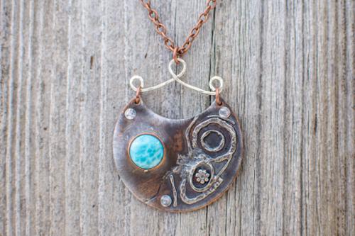 Bi-metal sterling and copper pendant with larimar natural stone riveted to embossed copper backplate and copper chain.